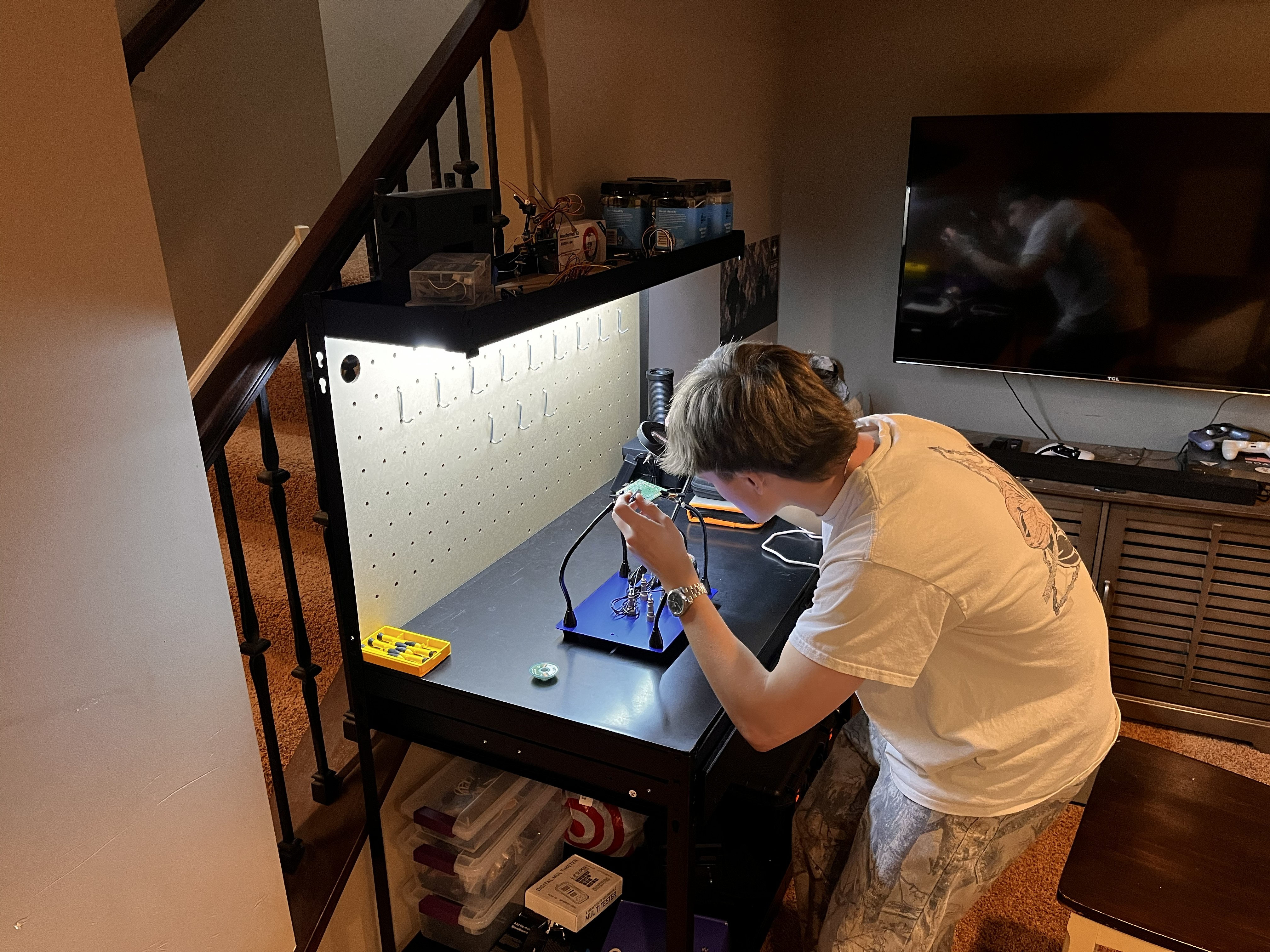 Luke working on a DIY electronics project